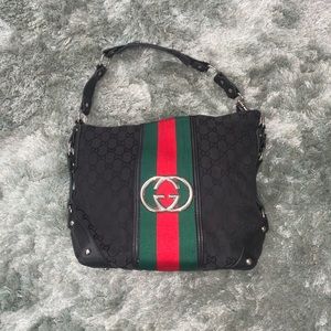 Black Gucci shoplifter bag